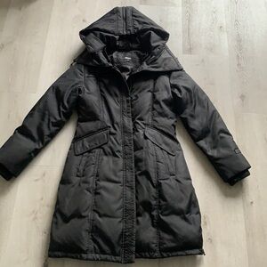 Woman’s DKNY black puffer Down filler mid length hooded size medium coat winter